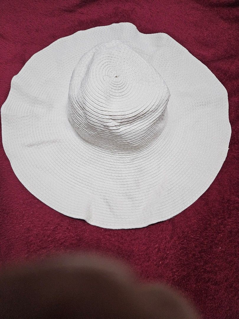 Wide Brim Sun Hat for Women (Category: Hats & Beanies) located in Caloocan City. Submitted by rm.diaz (Listing ID 1454903682, Image 1). Description: - Chic white wide brim sun hat - Ideal for beach trips and sunny days - Made from woven material - Folds easily for convenient storage - One size fits most - Stay protected from the sun in style!.