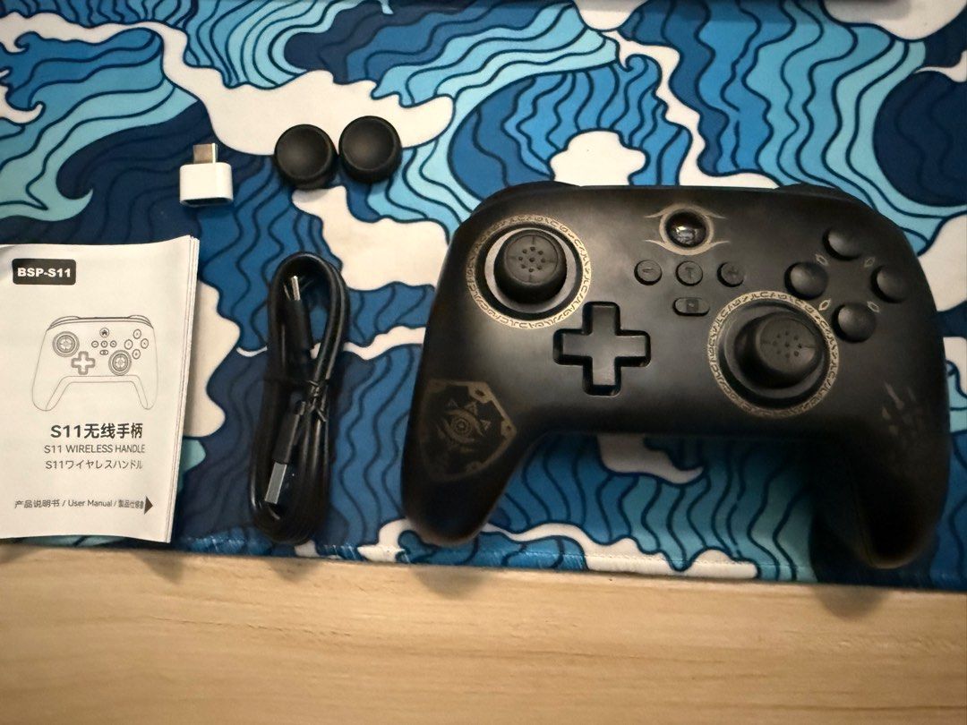 Wireless Gaming Controller (Category: Controllers) located in Singapore. Submitted by hxnmalas (Listing ID 1454788048, Image 2). Description: Wireless Gaming Controller Comes with - Manual - Wire cable for controller - Usb Adapter - Grips.