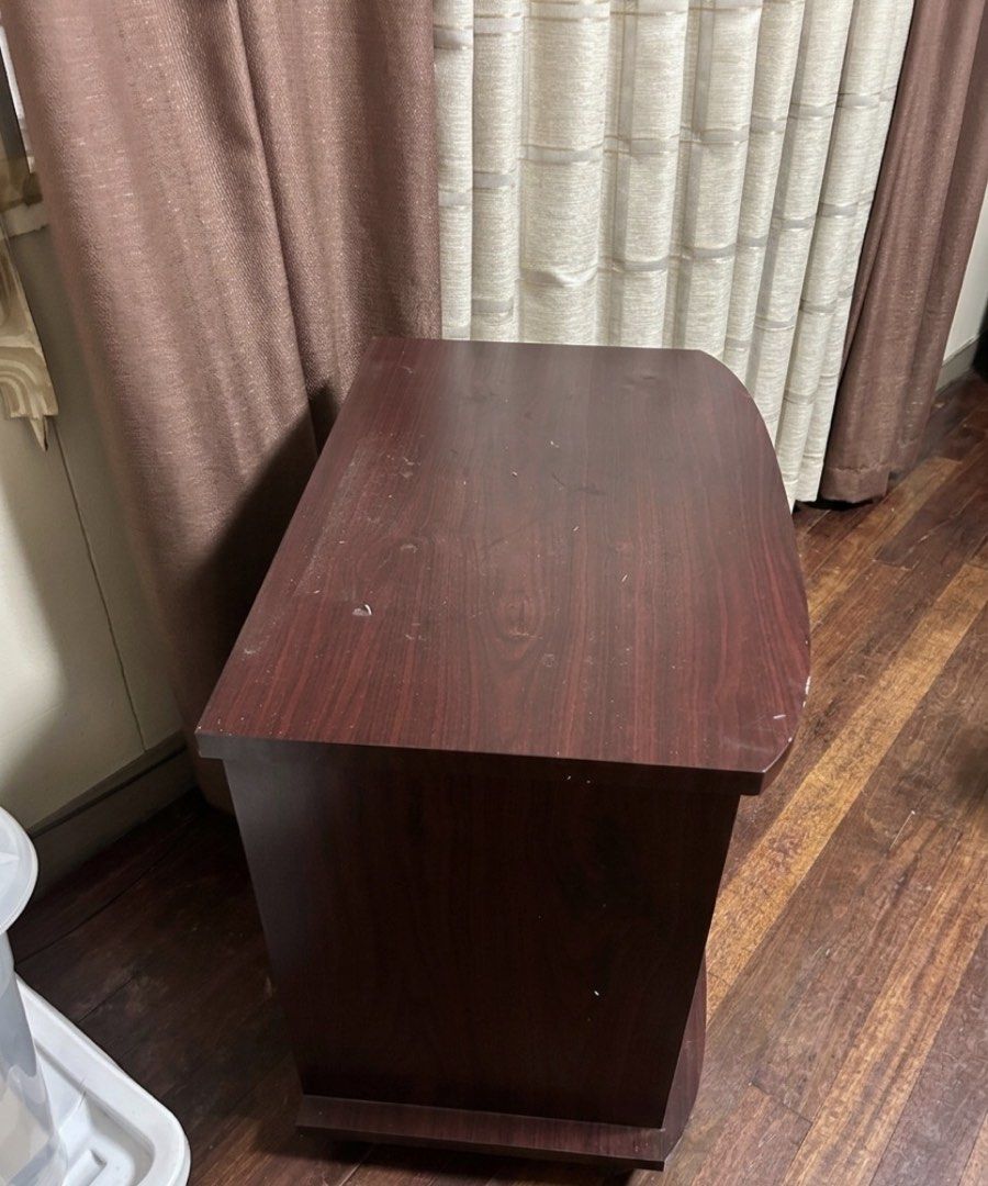 Wooden Side Table with Shelves (Category: Tables & Sets) located in Manila. Submitted by silverhawk.069da5 (Listing ID 1454779084, Image 3). Description: - Dark wood finish - Two open shelves for storage - Unique curved top surface - Ideal as a bedside table or accent piece - Versatile for any room - Lightweight and easy to move.