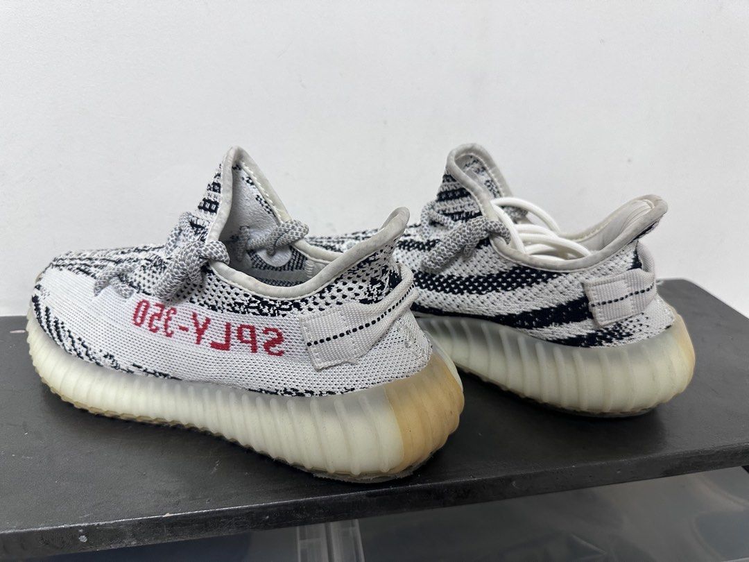 YEEZY V2 ZEBRA (Category: Sneakers) located in Las Pinas. Submitted by treyyywayyy (Listing ID 1454864901, Image 2). Description: ISSUE: SLIGHT YELLOWING SIZE 7.5 UNISEX PRICE NEGOTIABLE.