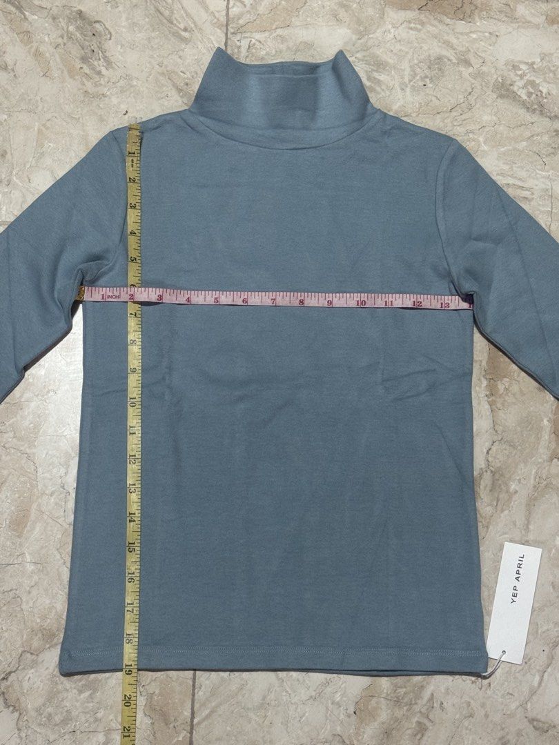 YEP APRIL Blue Turtleneck Top Long Sleeve (Category: Longsleeves) located in Quezon City. Submitted by EveryWANTShop (Listing ID 1454889383, Image 1). Description: - Brand: YEP APRIL - Color: Blue - Style: Long sleeve turtleneck top - Material: Organic cotton - Condition: Brand new, still in original packaging - Features: A versatile basic piece for any wardrobe.