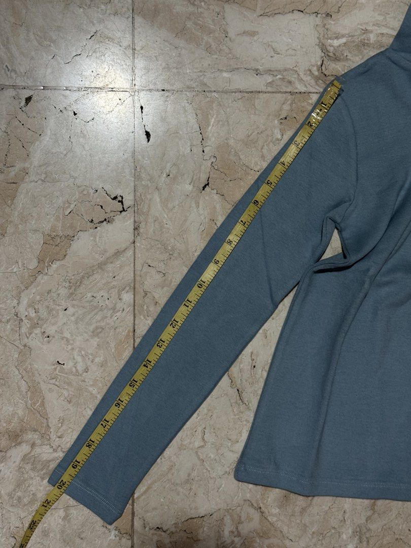YEP APRIL Blue Turtleneck Top Long Sleeve (Category: Longsleeves) located in Quezon City. Submitted by EveryWANTShop (Listing ID 1454889383, Image 2). Description: - Brand: YEP APRIL - Color: Blue - Style: Long sleeve turtleneck top - Material: Organic cotton - Condition: Brand new, still in original packaging - Features: A versatile basic piece for any wardrobe.
