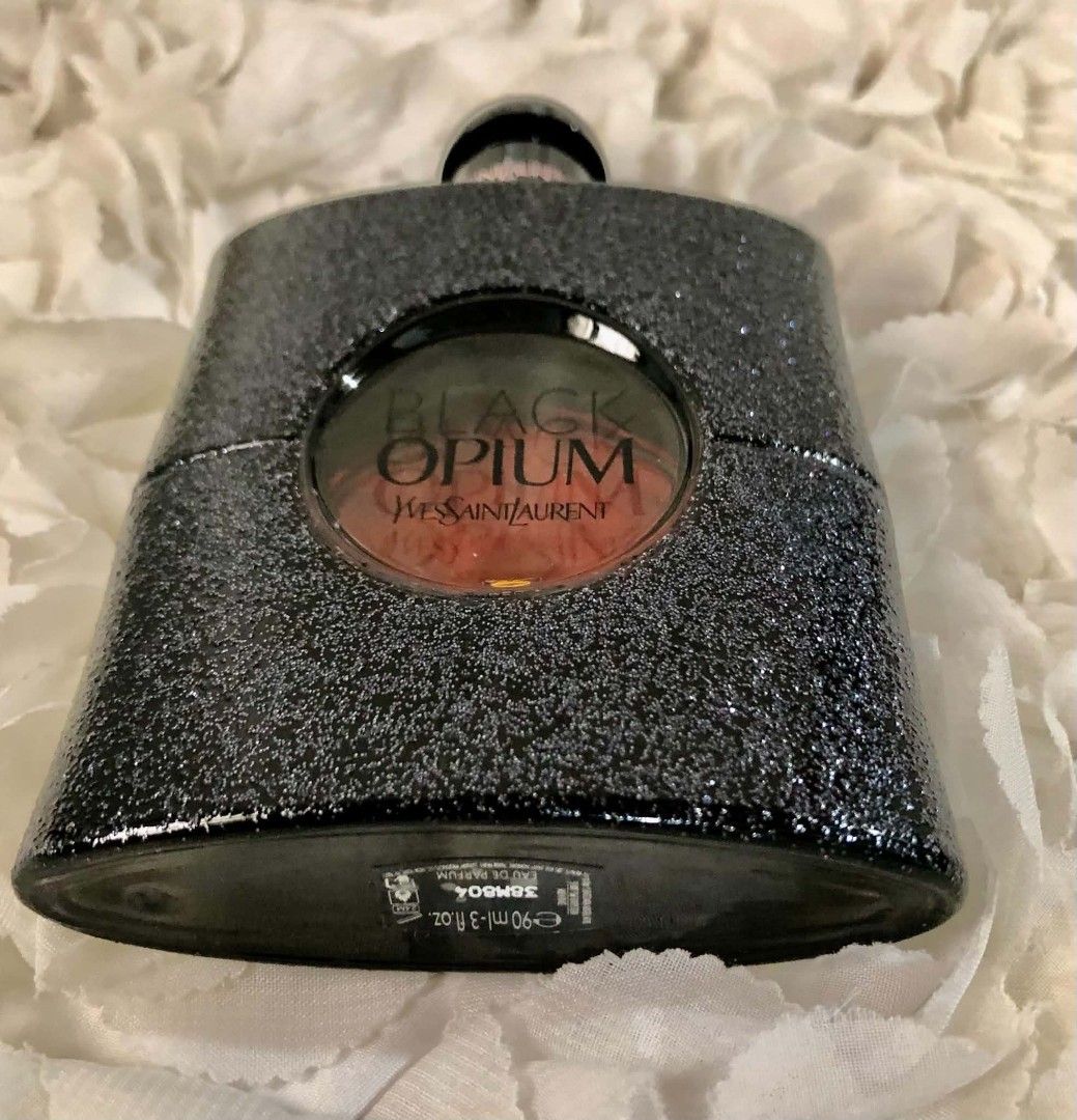 Yves Saint Laurent Black Opium Eau de Parfum 90ml (Category: Fragrance & Deodorants) located in Imus. Submitted by sharislane (Listing ID 1454772552, Image 3). Description: - Authentic Yves Saint Laurent Black Opium Eau de Parfum - 90ml bottle size - Features the signature sparkly black bottle design - Highly popular and captivating fragrance - Versatile for both everyday wear and special nights out - Selling because of an extensive perfume colle