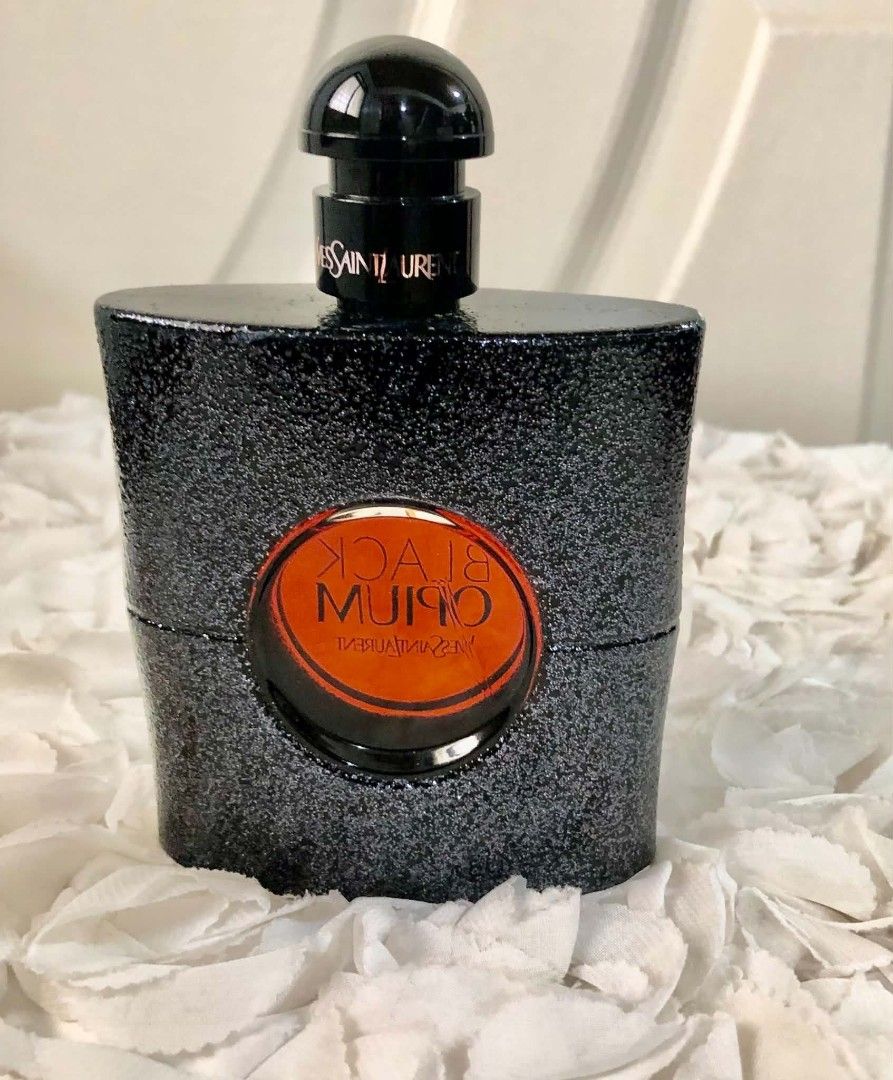 Yves Saint Laurent Black Opium Eau de Parfum 90ml (Category: Fragrance & Deodorants) located in Imus. Submitted by sharislane (Listing ID 1454772552, Image 2). Description: - Authentic Yves Saint Laurent Black Opium Eau de Parfum - 90ml bottle size - Features the signature sparkly black bottle design - Highly popular and captivating fragrance - Versatile for both everyday wear and special nights out - Selling because of an extensive perfume colle