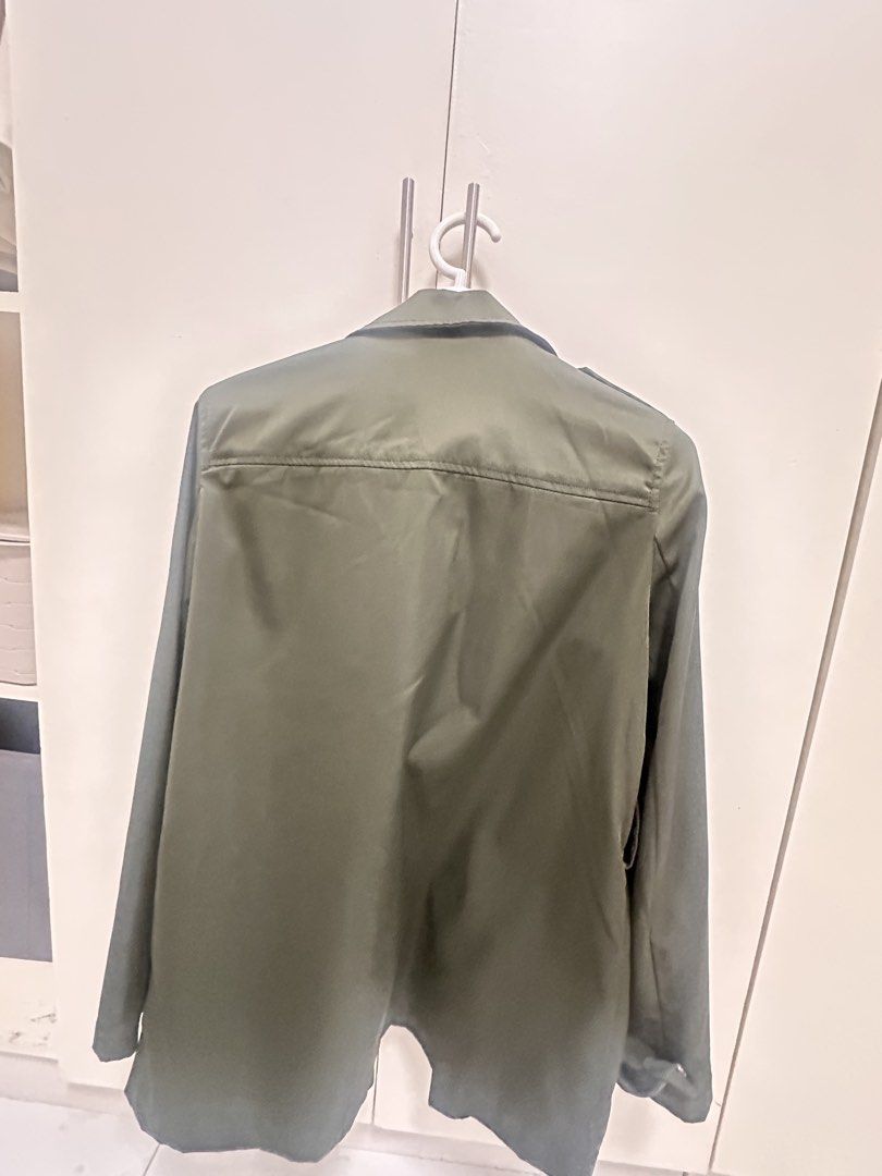 Zara Basic Olive Green Utility Jacket (Category: Coats, Jackets and Outerwear) located in Quezon City. Submitted by sammylicious (Listing ID 1454943473, Image 3). Description: - Zara Basic olive green utility jacket - Button-up front - Classic collar - Functional pockets - Shoulder epaulets - Ideal for casual layering and versatile styling.
