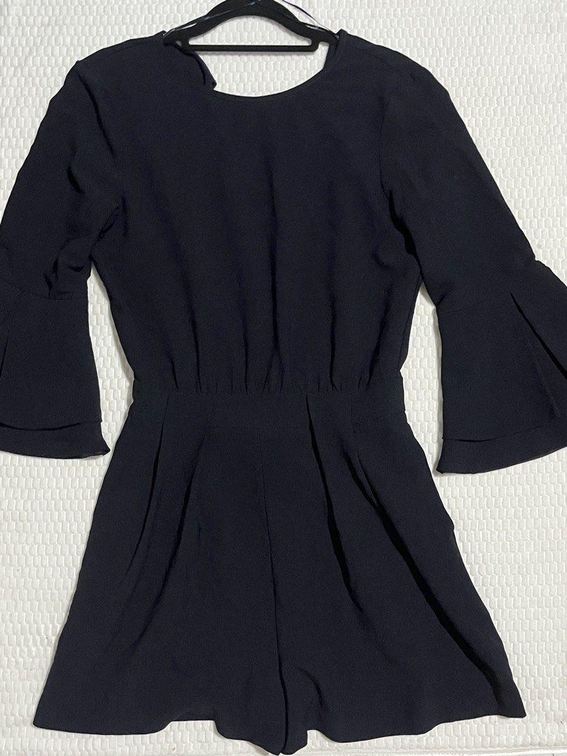 Zara Black Bell Sleeve Open Back Jumpsuit (Category: Jumpsuits) located in Muntinlupa City. Submitted by lovedbysabel (Listing ID 1452607675, Image 3). Description: Black Zara Basic Collection jumpsuit. Bought at Zara Greenbelt. No flaws at all and in very good condition. Features bell sleeves and a cinched waist. Back zipper closure with a tie detail at the neck. Making space in my closet, so I’m letting go of some of my clothes at super low pri