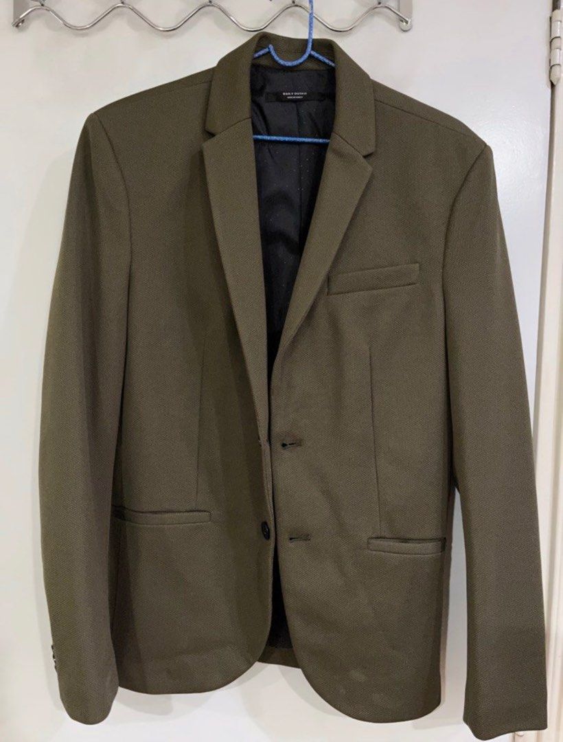 Zara Essentials Men's Blazer Jacket Olive Green (Category: Coats, Jackets and Outerwear) located in Bautista. Submitted by aldringarciaaa (Listing ID 1454880094, Image 1). Description: - Zara Essentials olive green blazer - Classic two-button closure - Features a stylish patterned black lining - Perfect for smart casual or formal occasions - Excellent for layering.