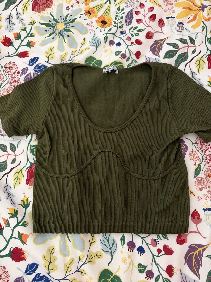Zara Green Cropped Ribbed Shirt (Category: Blouses) located in Muntinlupa City. Submitted by monicaleonor (Listing ID 1454815595, Image 1). Description: - cropped and tight fit .