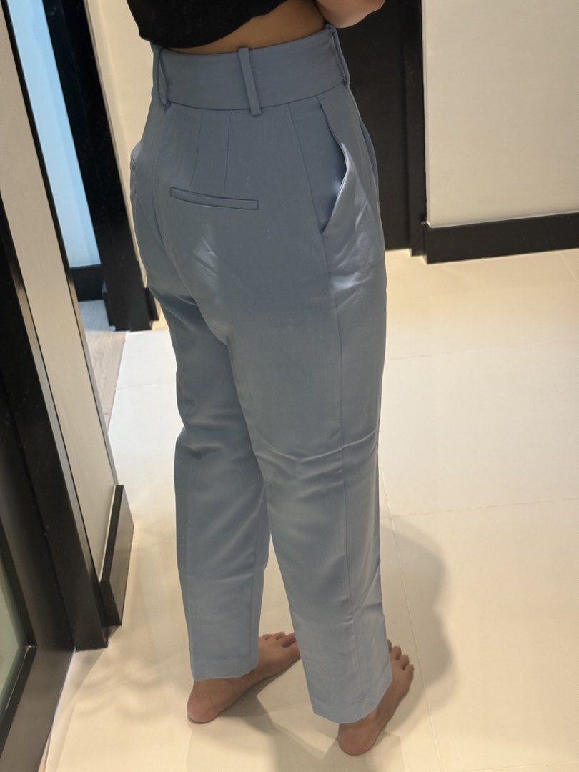 Zara Light Blue High-Waisted Trousers (Category: Other Bottoms) located in Manila. Submitted by qfclutz (Listing ID 1454805415, Image 2). Description: - Light blue trousers - High-waisted design - Straight leg cut - Functional pockets - Versatile for work or casual wear.