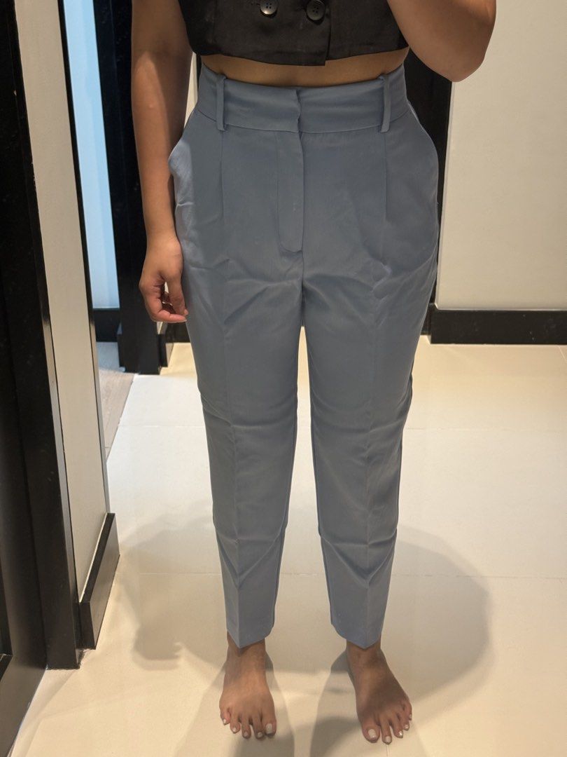 Zara Light Blue High-Waisted Trousers (Category: Other Bottoms) located in Manila. Submitted by qfclutz (Listing ID 1454805415, Image 1). Description: - Light blue trousers - High-waisted design - Straight leg cut - Functional pockets - Versatile for work or casual wear.