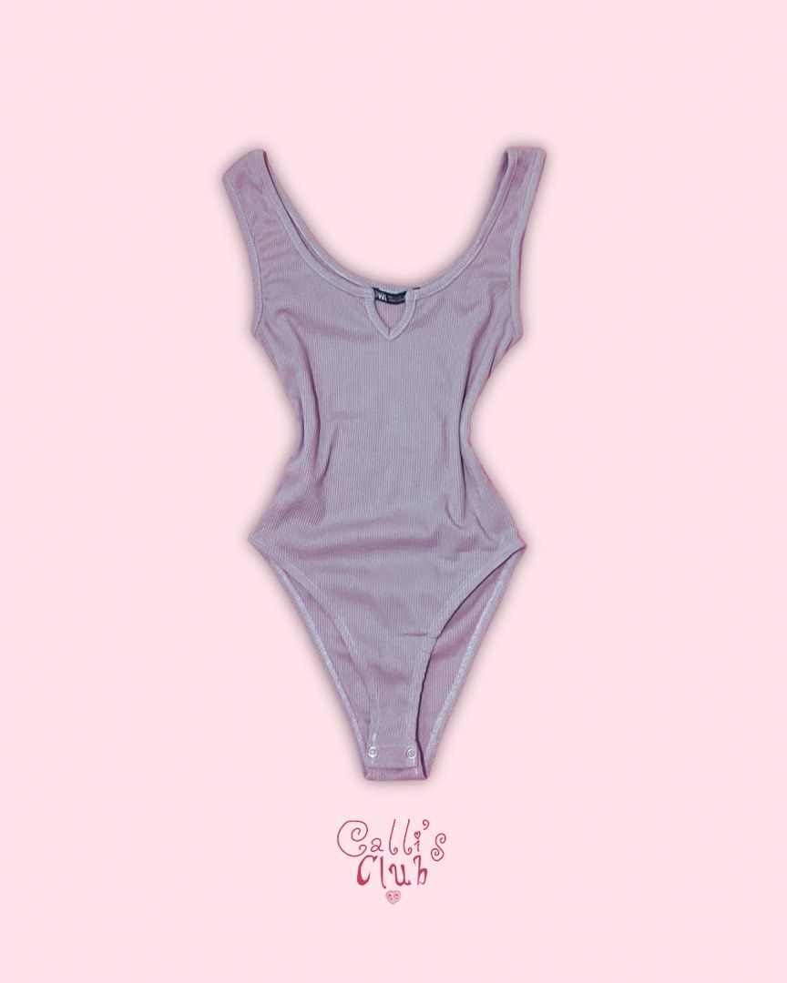 ZARA Ribbed V-Neck Bodysuit - Mauve (Category: Others Tops) located in Quezon City. Submitted by callist0 (Listing ID 1454937885, Image 1). Description: - Mauve ribbed bodysuit from ZARA - V-neckline with a small cutout detail - Sleeveless design - Snap closure at the bottom - Stretchy and comfortable material - Perfect basic piece for any wardrobe mop — gcash | bank transfer (Metrobank or BPI) delivery — through Grab express, Lalamove, Joyride, 