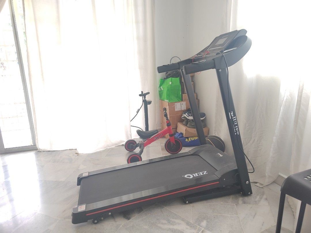 ZERO Treadmill (Category: Cardio & Fitness Machines) located in Petaling Jaya. Submitted by nini_nn (Listing ID 1454948959, Image 1). Description: - Foldable ZERO treadmill - Perfect for home workouts - Tracks: Speed, Distance, Time, Calories - Sturdy and durable frame - Good-sized running belt - Ready for your fitness journey! - Pick up only.