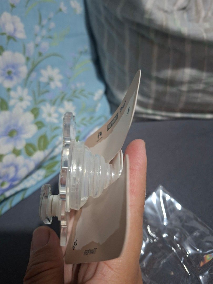 ZSIGA PHONE GRIP (Category: Mounts & Holders) located in Baguio. Submitted by meganmeganv (Listing ID 1454764425, Image 3). Description: LUCKIN COFFEE X POP MART ZSIGA PHONE GRIP.