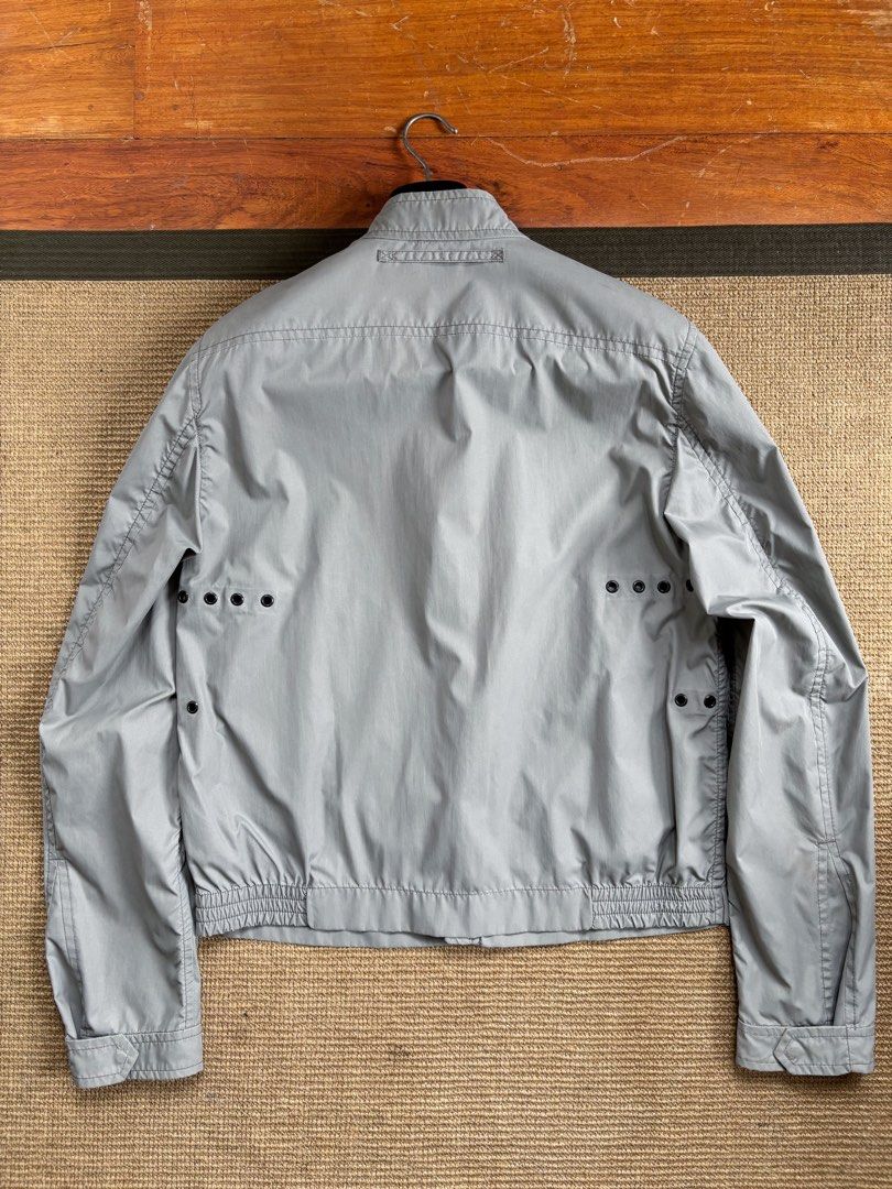 00s Prada Linea Rossa Technical Nylon Cafe Racer (Category: Coats, Jackets and Outerwear) located in Paranaque City. Submitted by grailonious (Listing ID 1455007258, Image 2). Description: Cropped fit cafe racer-style nylon jacket from 90s - early 2000s Prada Amazing condition except the singe stain on the front right pocket area All measurements posted.