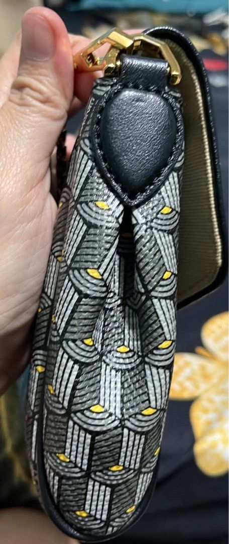 4US CESARE PACIOTTI (Category: Luxury Bags & Wallets) located in Cagayan de Oro. Submitted by apbeja (Listing ID 1455138605, Image 3). Description: Classic Longchamp shoulder bag. Features the signature geometric pattern in grey, black, and yellow. Gold chain strap. Envelope flap closure. Great for day or night. Clean interior. Comes with dust bag..