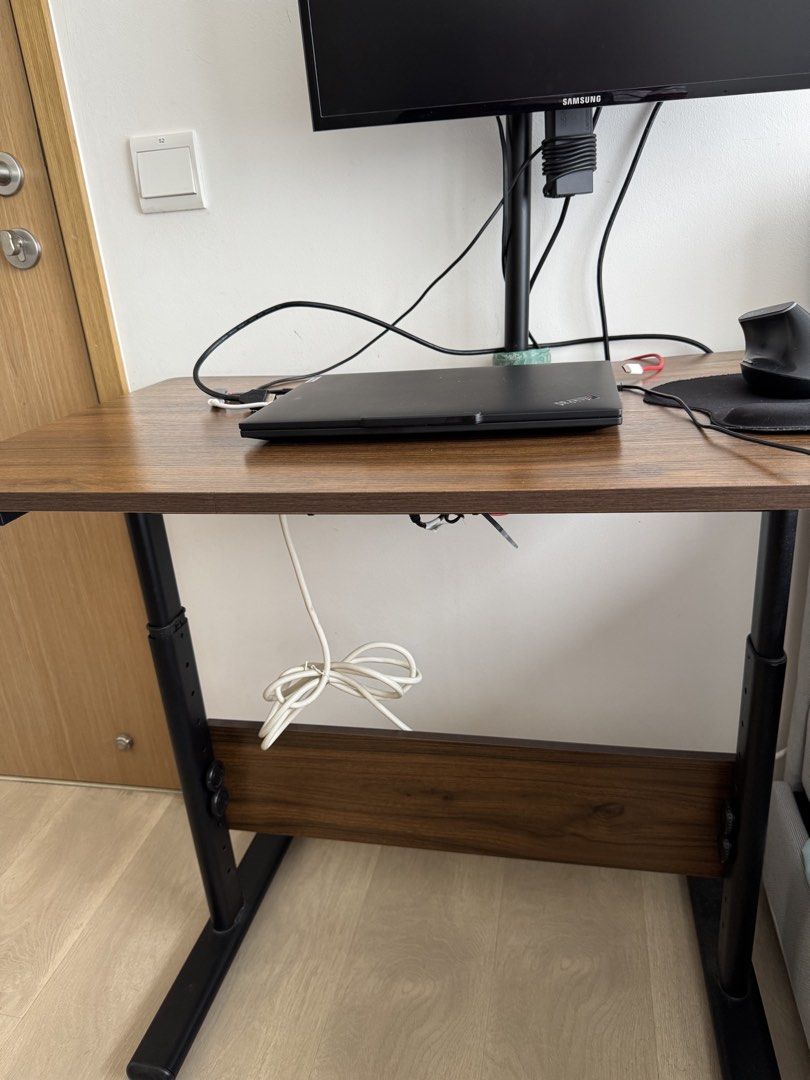 Adjustable standing computer table (Category: Tables & Sets) located in Singapore. Submitted by kjajesh (Listing ID 1455044094, Image 2). Description: Adjustable standing desk. Less than 5month, hardly used Selling due to clearing space .