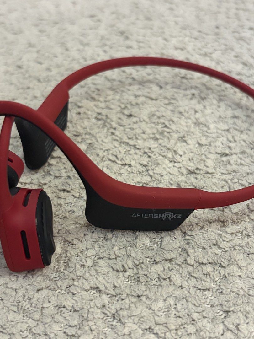 AfterShokz Red Bone Conduction Headphones (Category: Headphones & Headsets) located in Quezon City. Submitted by minimalmania (Listing ID 1455127210, Image 2). Description: - Red AfterShokz bone conduction headphones - Ideal for sports and outdoor activities - Stay aware of your surroundings while listening - Lightweight and comfortable design - Excellent working condition.