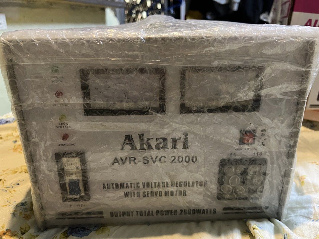 Akari AVR-SVC 2000 Automatic Voltage Regulator with Servo Motor (Category: Electrical, Adaptors & Sockets) located in Quezon City. Submitted by dlarej123 (Listing ID 1455117532, Image 1). Description: - Akari AVR-SVC 2000 Automatic Voltage Regulator - 2000 Watts total power output - Servo motor for precise regulation - Automatically stabilizes voltage - Protects your appliances from damaging fluctuations - Equipped with 3 outlets BRAND NEW BUT NO