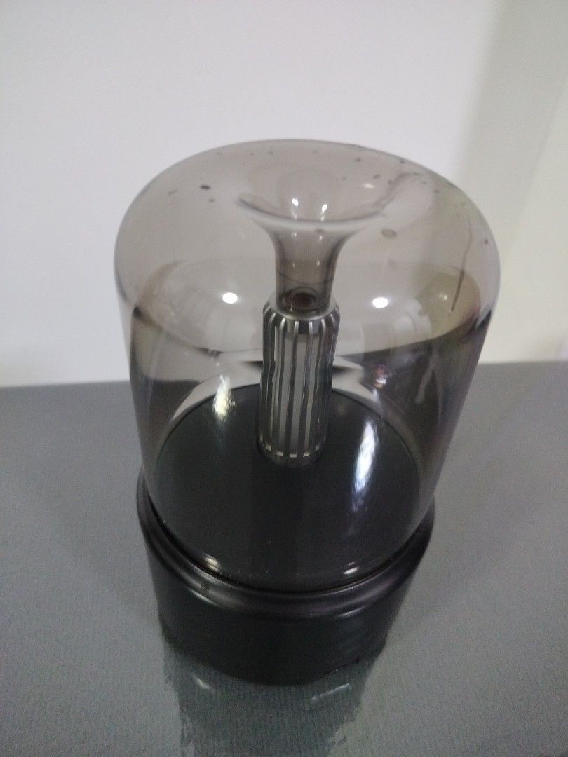 Aroma diffuser (Category: Everything Else) located in Singapore. Submitted by queeniegoh78402 (Listing ID 1455038780, Image 2). Description: - Elegant smoky glass dome cloche aroma diffuser -USB charge -woth orange light - Sturdy black round base .