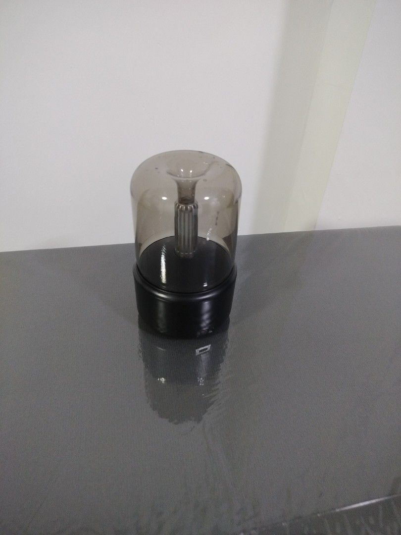 Aroma diffuser (Category: Everything Else) located in Singapore. Submitted by queeniegoh78402 (Listing ID 1455038780, Image 1). Description: - Elegant smoky glass dome cloche aroma diffuser -USB charge -woth orange light - Sturdy black round base .