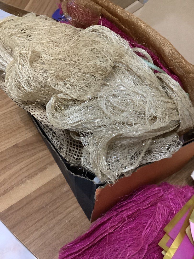 Assorted Craft Materials - Mesh, Paper, Raffia (Category: Craft Supplies & Tools) located in Batangas. Submitted by v.ukay (Listing ID 1455031755, Image 2). Description: - Gold and pink mesh netting - Beige raffia - Gold and pink metallic paper sheets - Cream-colored paper - Ideal for gift wrapping, decorations, and DIY projects PRICE WILL DEPEND ON HOW MUCH MATERIALS YOU WILL PURCHASE - All materials are clean and ready to use.