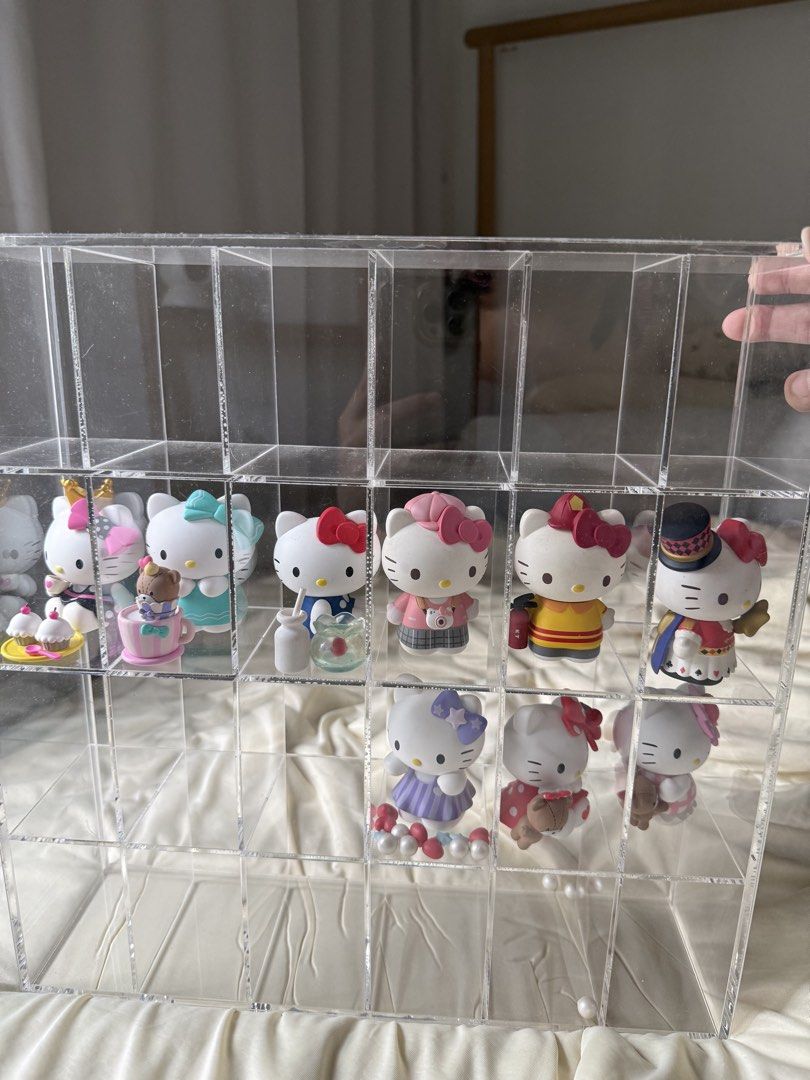 Assorted Hello kitty (Category: Designer & Blind Box Toys) located in Singapore. Submitted by koji07 (Listing ID 1455043560, Image 1). Description: Assorted Hello kitty $5 each All for $20 Take all with acrylic display box $30 Zoom in for flaws, some have turned yellowish / not for fussy buyer.