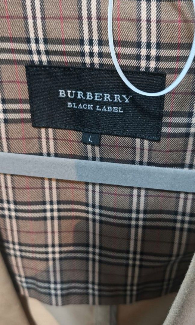 Authentic Burberry Coat Size L (Category: Coats, Jackets and Outerwear) located in Aguinaldo. Submitted by designerlaneph (Listing ID 1455106783, Image 3). Description: Previously owned Burberry coat size large 💯% authentic in mint condition free shipping onhand.