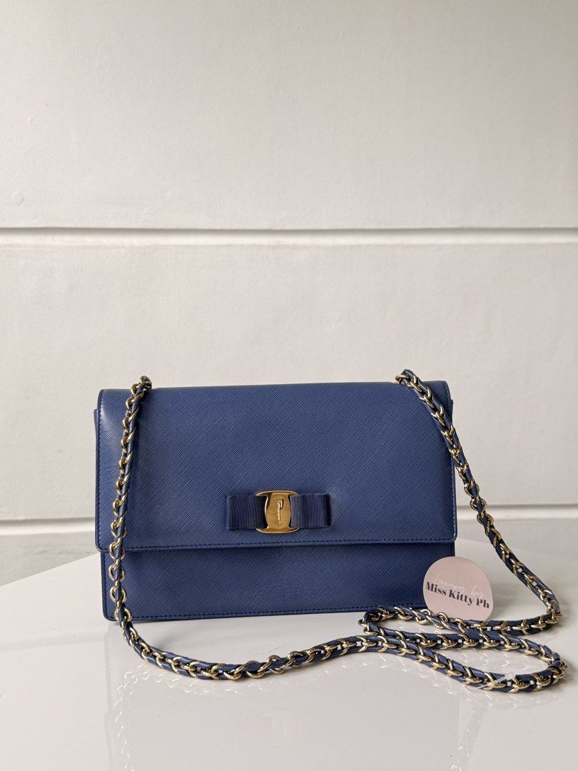 Authentic Preowned Salvatore Ferragamo Blue leather chain Bag (Category: Luxury Bags & Wallets) located in San Pablo. Submitted by misskittyph (Listing ID 1455105107, Image 1). Description: Salvatore Ferragamo Electric Blue Leather Ginny Shoulder Bag ▪️16.5k only . Measurements: (cm) 26L x 5 W x 16H; strap drop 54cm 8.9/10 condition This item is in excellent condition aside from tolerable discoloration on the bow No inclusion Layaway options avai
