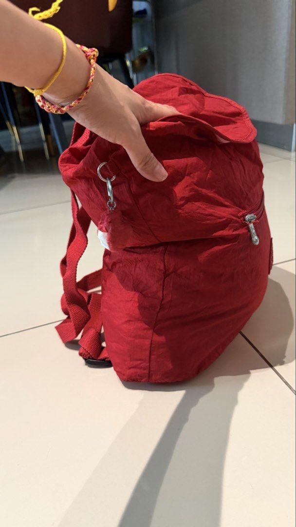 Authentic Red Kipling Backpack (Category: Backpacks) located in Petaling Jaya. Submitted by love.earth.love.recycle (Listing ID 1455052896, Image 2). Description: Can be fold become a smaller pouch easy to bring, great for holidays ~ can refer to the photo .