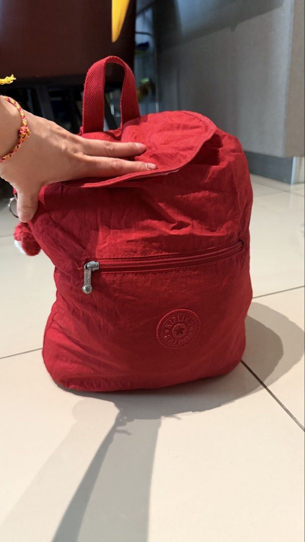 Authentic Red Kipling Backpack (Category: Backpacks) located in Petaling Jaya. Submitted by love.earth.love.recycle (Listing ID 1455052896, Image 1). Description: Can be fold become a smaller pouch easy to bring, great for holidays ~ can refer to the photo .