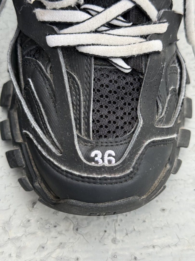 Balenciaga Track Sneakers Black (Category: Sneakers) located in Manila. Submitted by dipdrip (Listing ID 1455081974, Image 3). Description: - Balenciaga Track sneakers - Color: Black - Size: 36 - Condition: Lightly used - Minor scuffs on soles and edges from normal wear - White laces show some dirt - Plenty of life left, great for everyday wear Condition Need cleans only❗️ In excellent condition 2,000php Negotiable Open for COD via Lalamove aroun