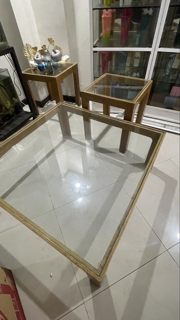Big Center Table with 2 side tables (Category: Tables & Sets) located in Rizal. Submitted by annelimited_stuffs (Listing ID 1455080832, Image 2). Description: - Big center table with two matching side tables - Features clear glass tops - Sturdy wooden frames - Modern and elegant design - Ideal for living rooms or lounge areas .
