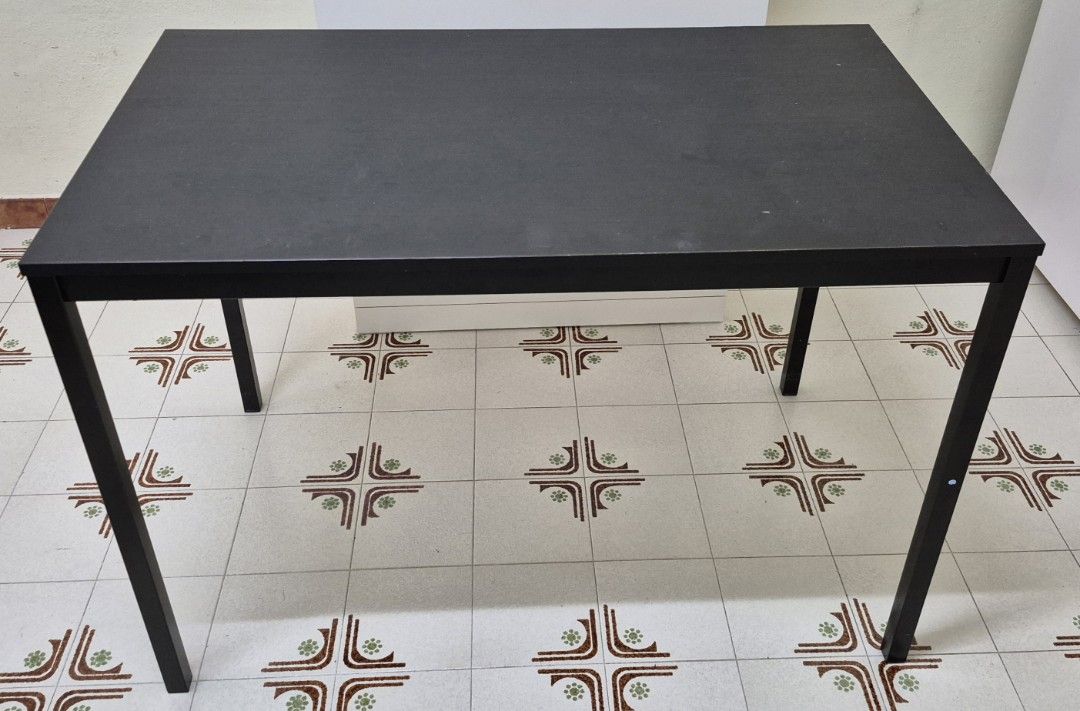 Black Dining Table (Category: Tables & Sets) located in Singapore. Submitted by mrjoo88 (Listing ID 1455026621, Image 1). Description: - Simple black dining table/desk - Ideal for small spaces - Sturdy metal legs - Easy-to-clean surface - Selling as upgraded - Pick up only L 110CM W67CM H74CM .