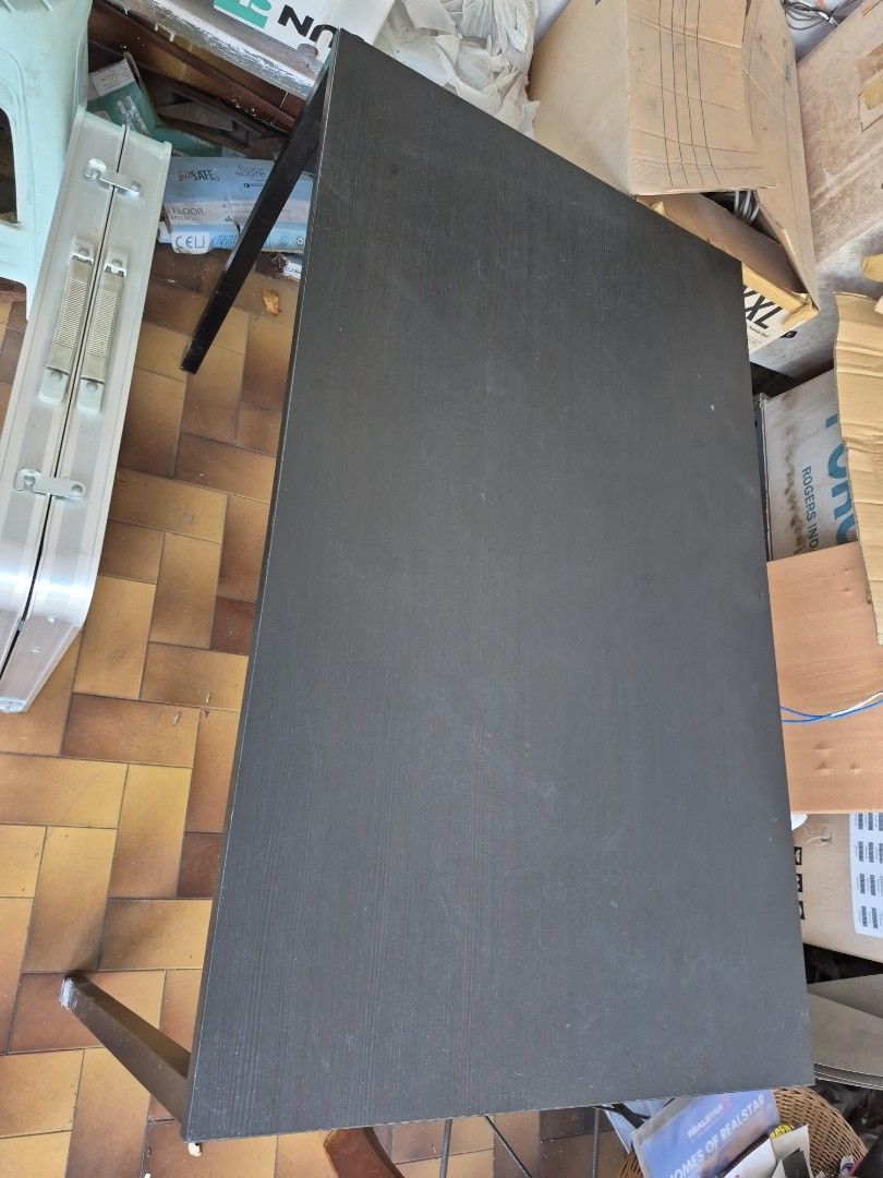 Black Dining Table (Category: Tables & Sets) located in Singapore. Submitted by mrjoo88 (Listing ID 1455026621, Image 2). Description: - Simple black dining table/desk - Ideal for small spaces - Sturdy metal legs - Easy-to-clean surface - Selling as upgraded - Pick up only L 110CM W67CM H74CM .