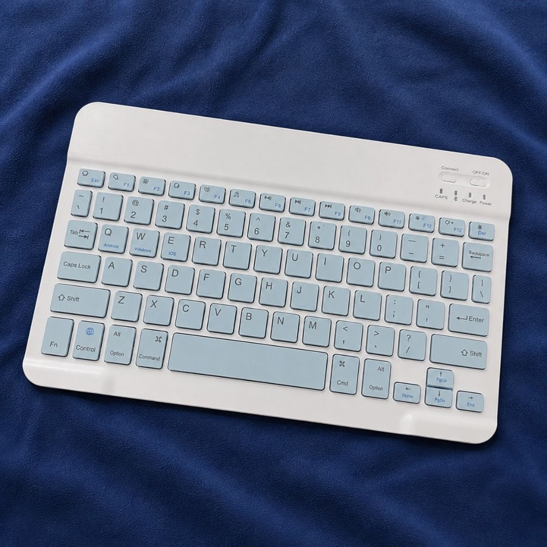 Bluetooth Mouse and Keyboard Kit - White & Light Blue (Category: Computer Keyboard) located in Quezon City. Submitted by alexisadraneda (Listing ID 1455067263, Image 3). Description: - Bluetooth Wireless Keyboard and Mouse Set - Keyboard: White with light blue keys - Mouse: Light blue - Includes charging cable - Compatible with tablets and computers - Works with Android and other operating systems - Compact and portable design.
