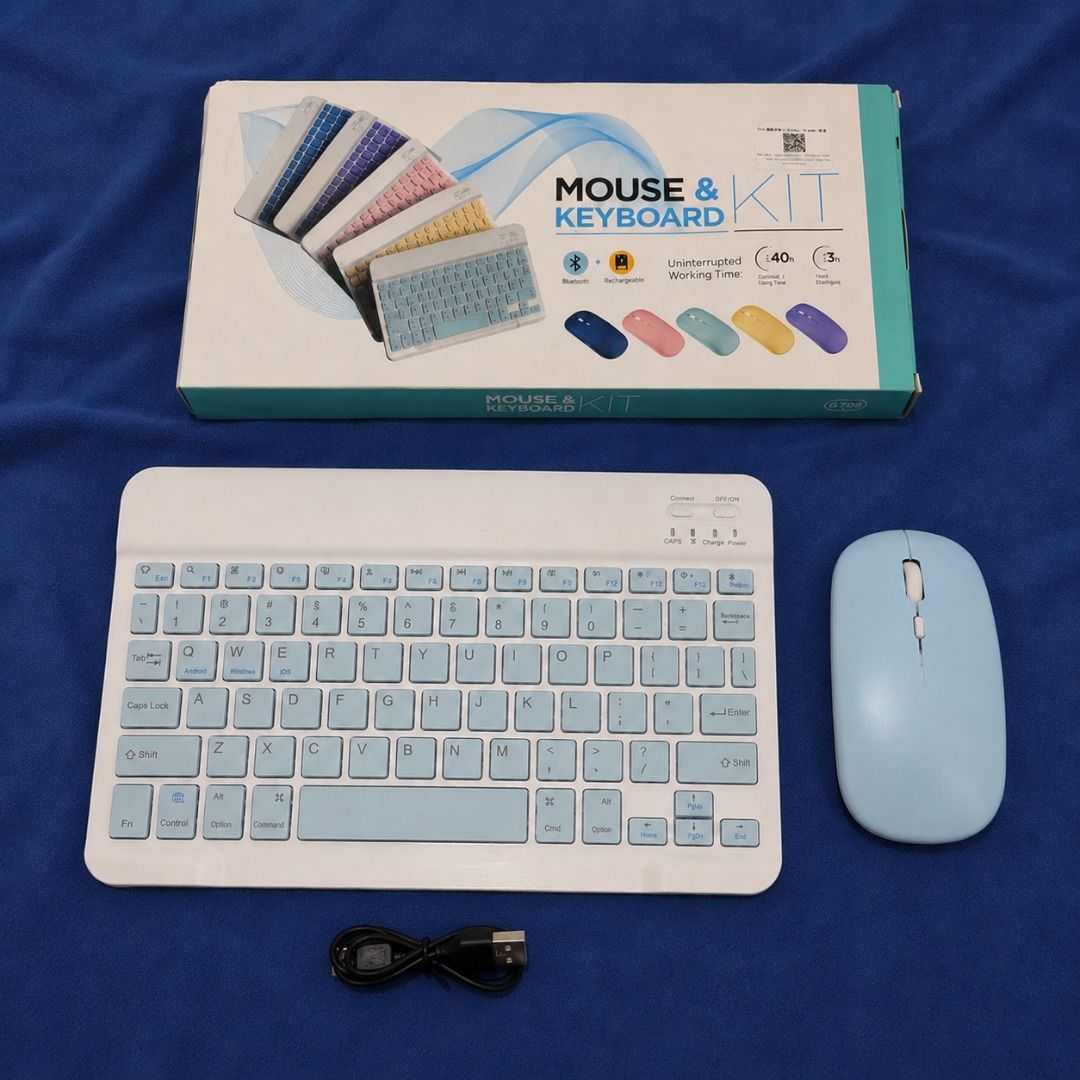 Bluetooth Mouse and Keyboard Kit - White & Light Blue (Category: Computer Keyboard) located in Quezon City. Submitted by alexisadraneda (Listing ID 1455067263, Image 2). Description: - Bluetooth Wireless Keyboard and Mouse Set - Keyboard: White with light blue keys - Mouse: Light blue - Includes charging cable - Compatible with tablets and computers - Works with Android and other operating systems - Compact and portable design.