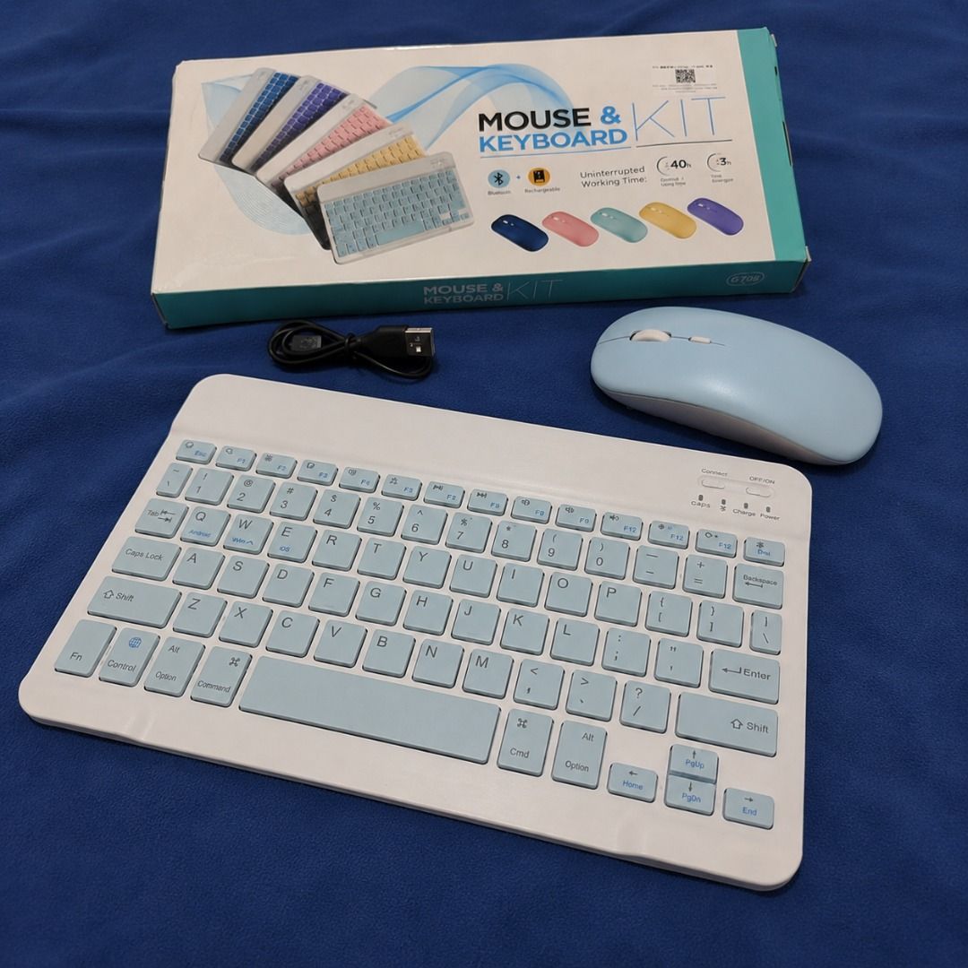 Bluetooth Mouse and Keyboard Kit - White & Light Blue (Category: Computer Keyboard) located in Quezon City. Submitted by alexisadraneda (Listing ID 1455067263, Image 1). Description: - Bluetooth Wireless Keyboard and Mouse Set - Keyboard: White with light blue keys - Mouse: Light blue - Includes charging cable - Compatible with tablets and computers - Works with Android and other operating systems - Compact and portable design.