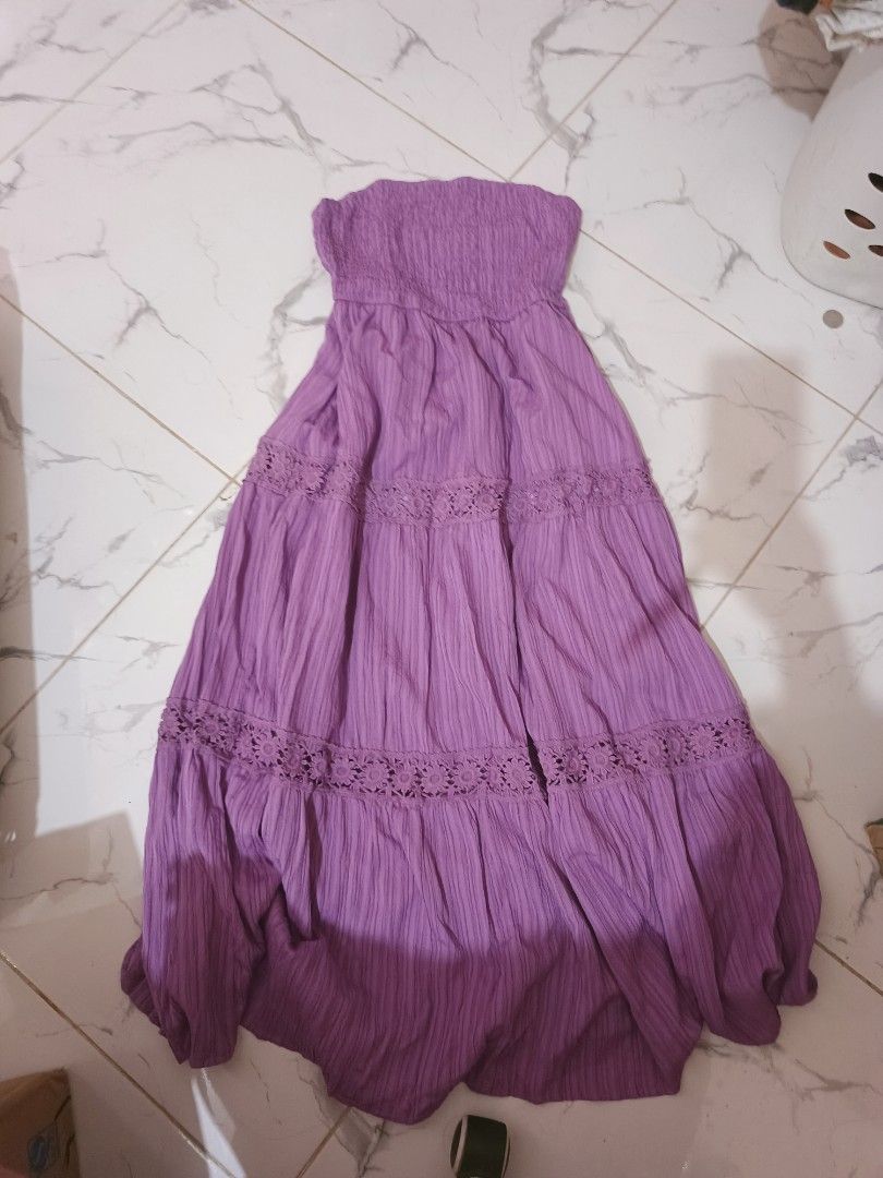 Boho Strapless Lilac blush in actual (Category: Dresses) located in Mandaluyong City. Submitted by mskitty_02 (Listing ID 1454995525, Image 1). Description: - Strapless midi dress - Smocked bust for a comfortable fit - Tiered skirt with delicate crochet lace details - Ideal for beach outings or summer parties - perfect for warm weather -Thick fabric good fabric -With inner lining -Lilac Blush color.