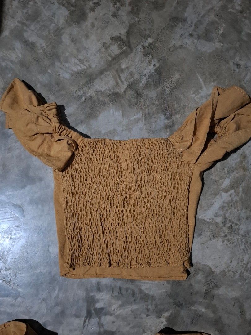 Brown off-shoulder ruffled top and skirt set (Category: Sets or Coordinates) located in Manila. Submitted by key_pii (Listing ID 1455065826, Image 2). Description: 280 Origin: Canada Best Fit for MEDIUM size Color Rate: 10/10 Condition: 10/10 No issue MOP: GCASH MOD: JNT (price+sf) Preloved, no cancellation.