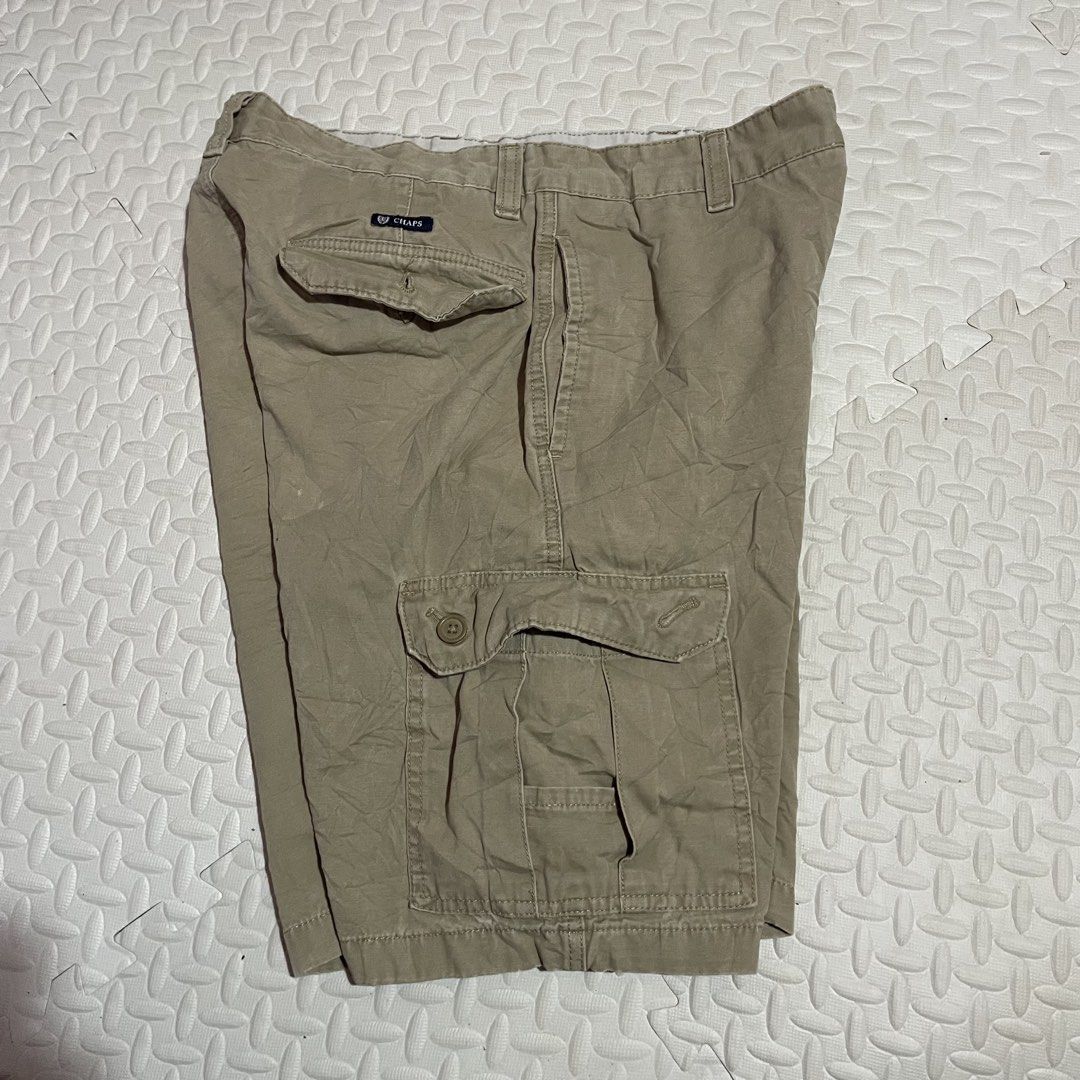 Chaps Cargo Shorts Size 33 Khaki Cotton (Category: Shorts) located in Zamboanga. Submitted by selvege (Listing ID 1455012428, Image 2). Description: - Brand: Chaps - Type: Cargo Shorts - Color: Khaki - Size: 33 - Material: 100% Cotton - Features: Multiple pockets with button closures - Style: Great for casual wear, pairs easily with t-shirts or polos Size 33 22.