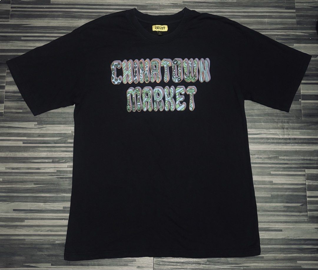 Chinatown market psychedelic tee (Category: Tshirts & Polo Shirts ) located in Manila. Submitted by thrift_district_2000 (Listing ID 1454996021, Image 1). Description: Size large on tag Dimes 22 x 30 No issue.