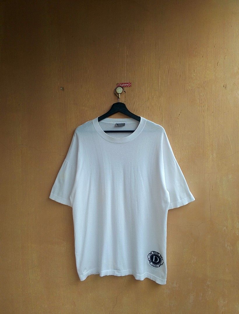 Christian Dior Couture Script T shirt (Category: Luxury Apparel) located in Lipa City. Submitted by MEECHYTWO2TWO (Listing ID 1455054890, Image 2). Description: • CHRISTIAN DIOR COUTURE SHIRT - Size: Large - Width: 22 / Length: 29.5 - Need Wash - Location: Lipa City, Batangas - Good condition - Color rate: 9.5/10 - Additional sf +75 - Mop: GCASH/NO COD - Payment first tomorrow will be shipped.