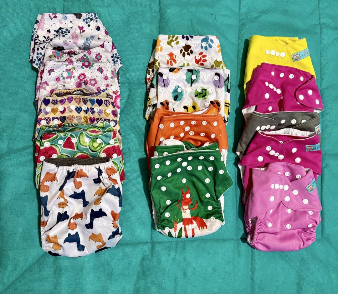 Cloth Diapers (Category: Diapers & Baby Wipes) located in Caloocan City. Submitted by buywithdeanne (Listing ID 1455072899, Image 2). Description: 14 cloth diapers and 10 lockheart inserts..