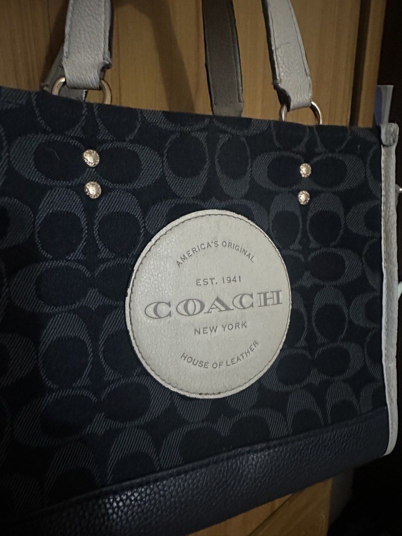 Coach Denim Depsey 22 (Category: Luxury Bags & Wallets) located in Batangas. Submitted by jhinp0t (Listing ID 1455045098, Image 2). Description: Coach Navy Blue Denim Depsey Bag Preloved, bawal po sa maselan, nirepair na yung handle para matibay. Needs wash. Mejo fade na yung white leather, pero yung denim mismo maganda pa. No sling included.