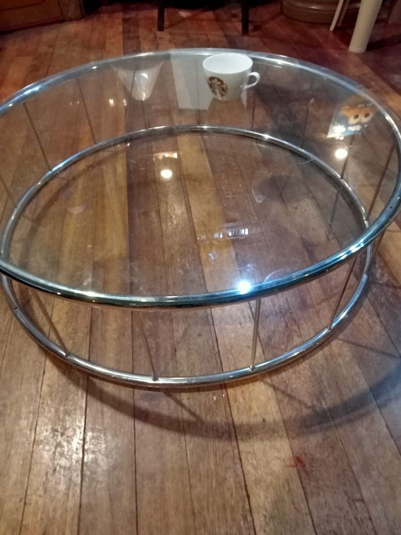 Coffee table (Category: Coffee & Tea Tableware) located in Paranaque City. Submitted by jakes.bodega (Listing ID 1455052941, Image 3). Description: measurements 3 feet and 3 inches diameter height approx 10.3 inches modern steel and glass coffee table. low type for throw pillows, Japanese style sitting....... NEGOTIABLE FOR SERIOUS BUYERS GREAT FOR SMALL OR BIG SPACES.