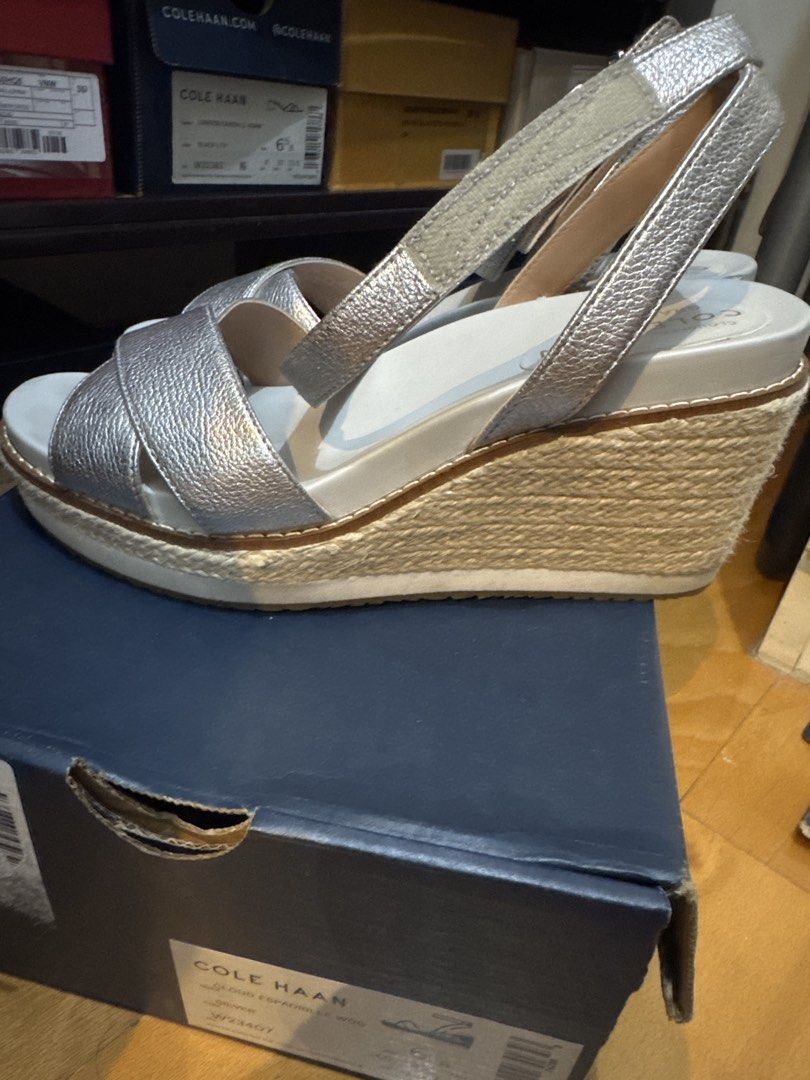 Cole Haan Cloud Espadrille Wedge Sandals Silver Size 6 (Category: Flats & Sandals) located in Taguig. Submitted by annapuno (Listing ID 1454953132, Image 2). Description: - Cole Haan Espadrille Wedge Sandals - Color: Silver - Size: 6 - Features: Comfortable Cloudfeel cushion - Condition: Minor scuffs on inner sole, slight wear on espadrille material - Notes: Still lots of life left in these comfy wedges Shipping Fee for buyer’s expense .