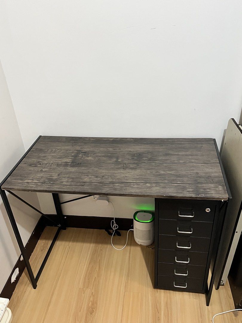 Computer/Study Table (Category: Tables & Sets) located in Manila. Submitted by sophiarvch37408 (Listing ID 1455021141, Image 3). Description: L: 100cm W: 50cm (File cabinet isn't included) Location: Commonwealth QC Rfs: Decluttering/Upgrade.