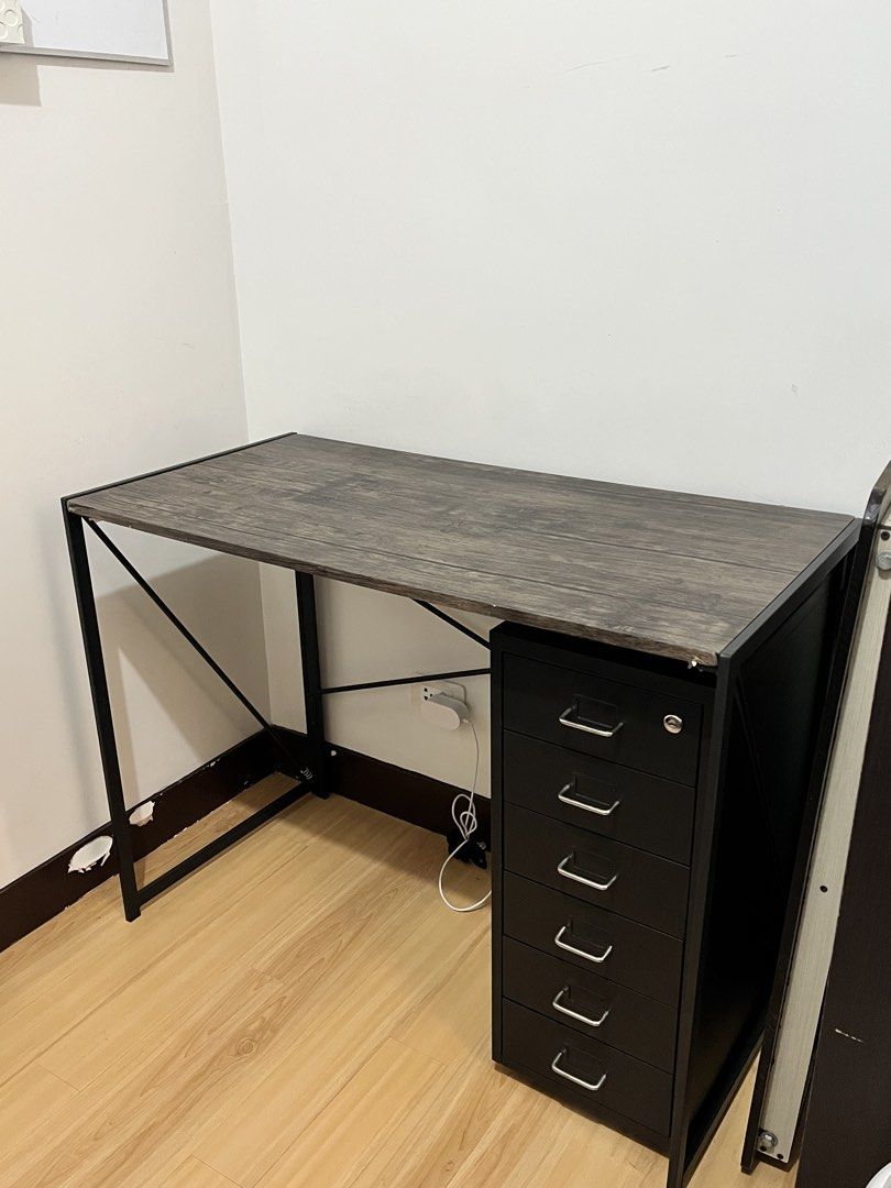 Computer/Study Table (Category: Tables & Sets) located in Manila. Submitted by sophiarvch37408 (Listing ID 1455021141, Image 2). Description: L: 100cm W: 50cm (File cabinet isn't included) Location: Commonwealth QC Rfs: Decluttering/Upgrade.