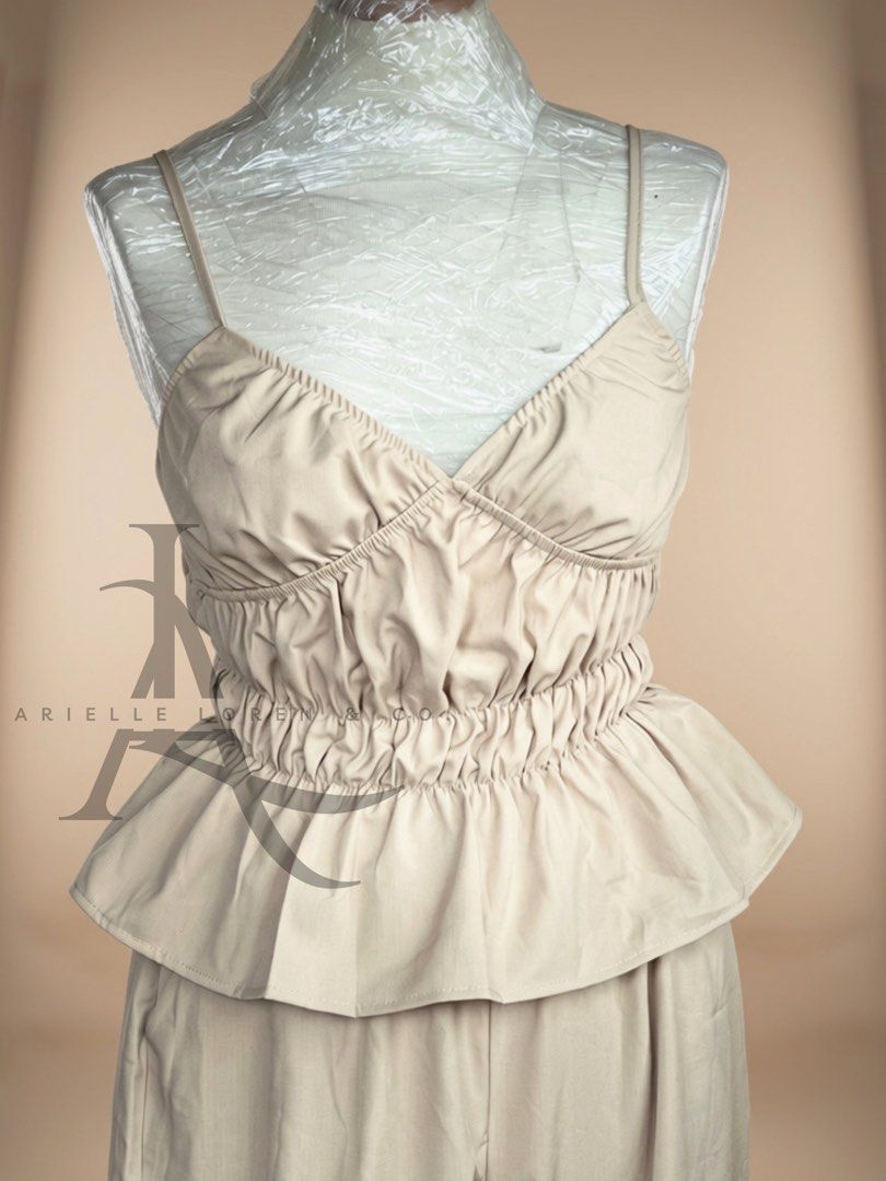 COORDS/TERNO Peplum Cinched Top with Pants - Light khaki (Category: Sets or Coordinates) located in Manila. Submitted by ariellelorenco (Listing ID 1454976027, Image 2). Description: -Color: LIGHT KHAKI -Soft fabric -Peplum style top -Tip is Cinched/ garterized on the waist -Adjustable straps -Smocked back -Bust size up to 40in max -Pants garterized /Genie style at the hem -Waist up to 36in max -With 2 side pockets ***These are all actual photos 