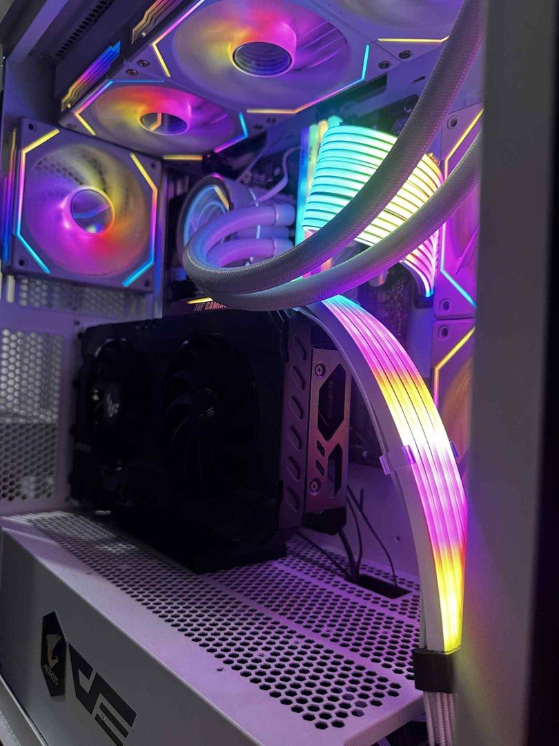 Custom Gaming PC (Category: Desktops) located in Cavite. Submitted by livebird-0d52 (Listing ID 1455010840, Image 2). Description: Processor: AMD Ryzen 5 5600G (6 Cores / 12 Threads) with Stock Cooler Graphics Card: AMD Radeon RX 6500 XT 4GB Motherboard: Gigabyte B550M DS3H AC RAM: 32GB DDR4 2666MHz (16GB x 2) Storage: 1TB Lexar NM790 NVMe M.2 SSD + 112GB Kingston SATA SSD - Features: Multiple RGB fans and lighting - Performance: Runs games smoot